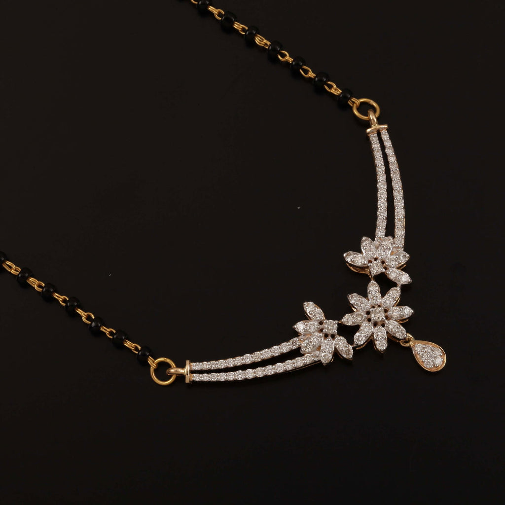 A appealing Collection of diamond Mangalsutra with Precious Gems and Jewels in Gold and Diamonds at RB diamond jewellers.