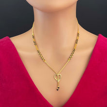 Load image into Gallery viewer, A appealing Collection of diamond Mangalsutra with Precious Gems and Jewels in Gold and Diamonds at RB diamond jewellers.
