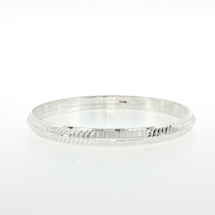 Sterling Silver Diamond Cut Textured Solid Bangle with internal Diameter 60mm