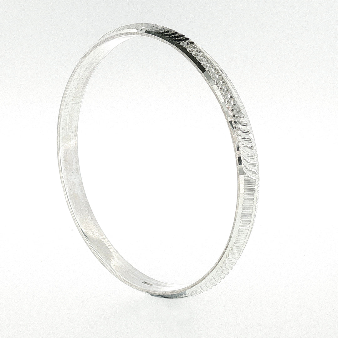 Sterling Silver Diamond Cut Textured Solid Bangle with internal Diameter 60mm