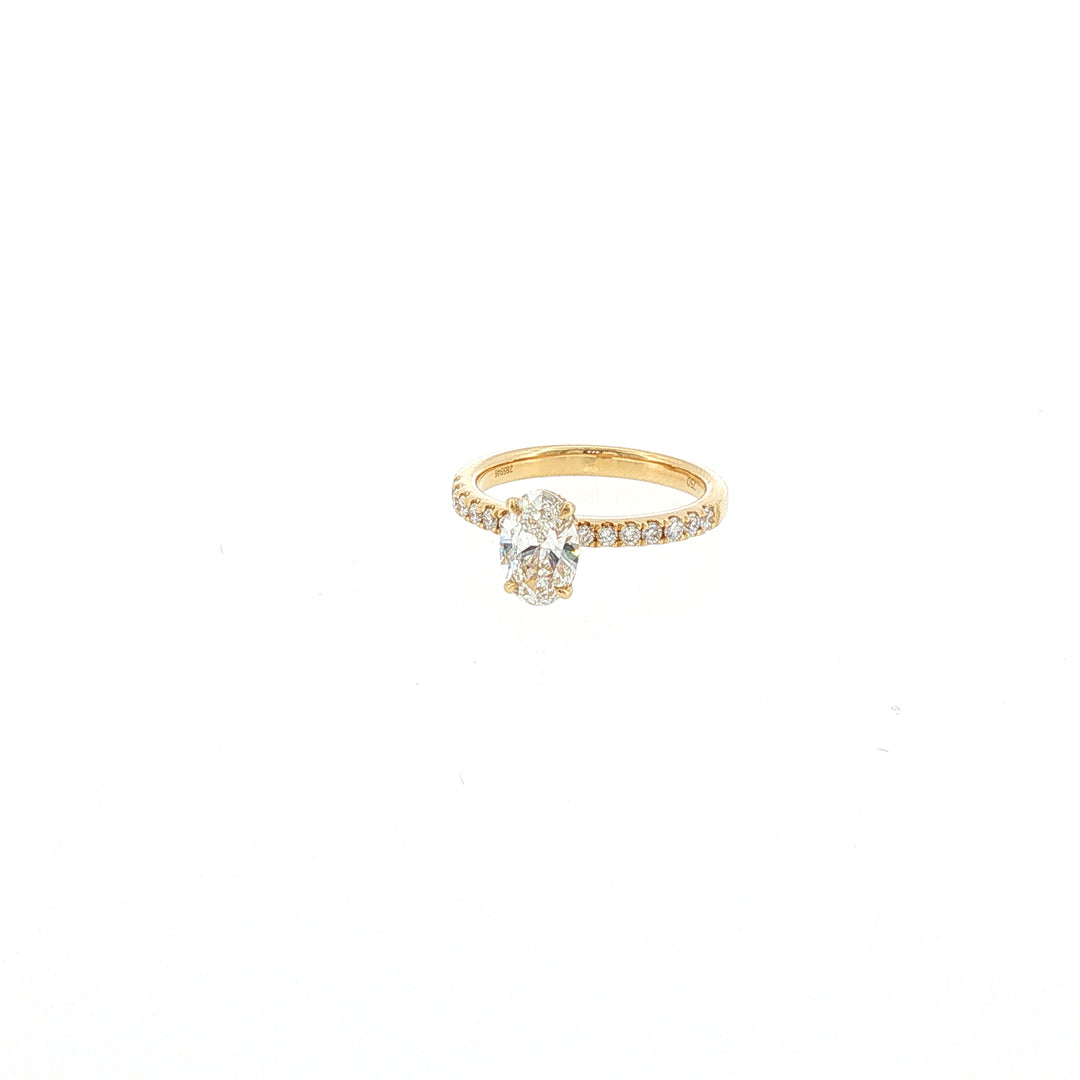 18K YG LAb Grown Oval Shape Diamond Ring with side diamond.